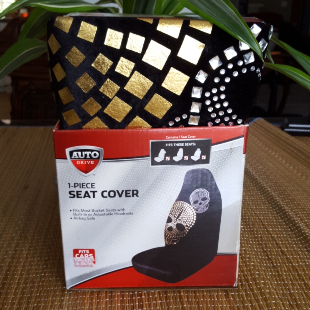 Seat cover. No longer have the box shown, but it is brand new, never used.